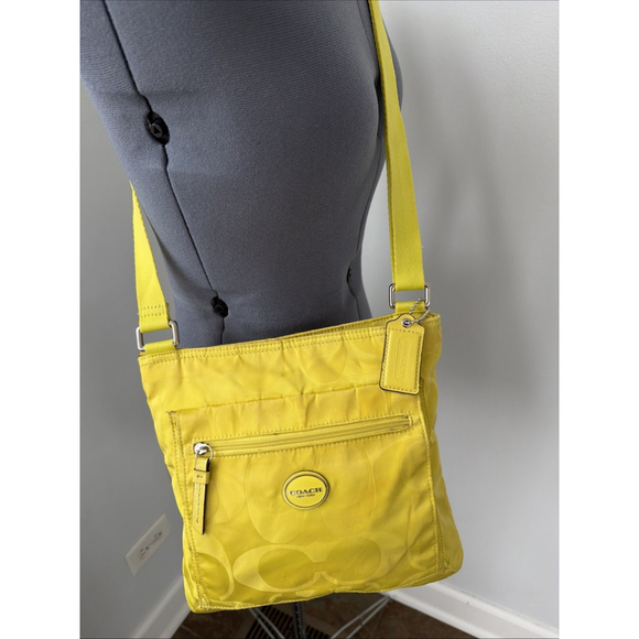 Coach Handbags - Vintage 90’s Coach Signature Logo Yellow
Nylon Colorblock Crossbody Bag F77408